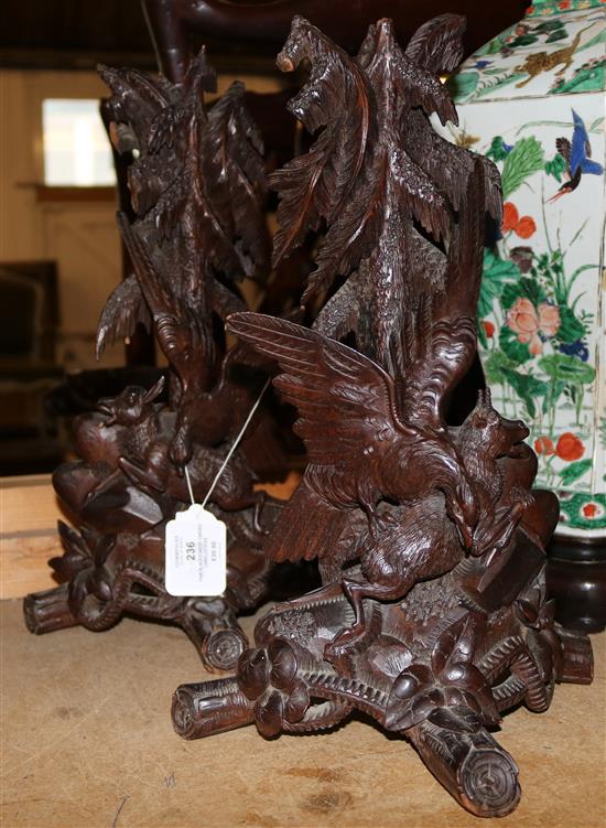 Pair Black Forest carved candlesticks